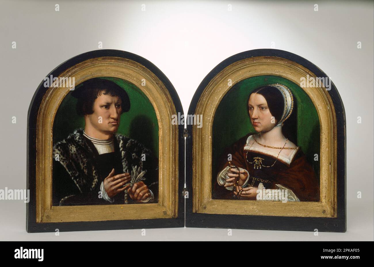 Portraits of Cornelius Duplicius de Scheppere and his wife Elizabeth Donche circa 1540 by Ambrosius Benson Stock Photo