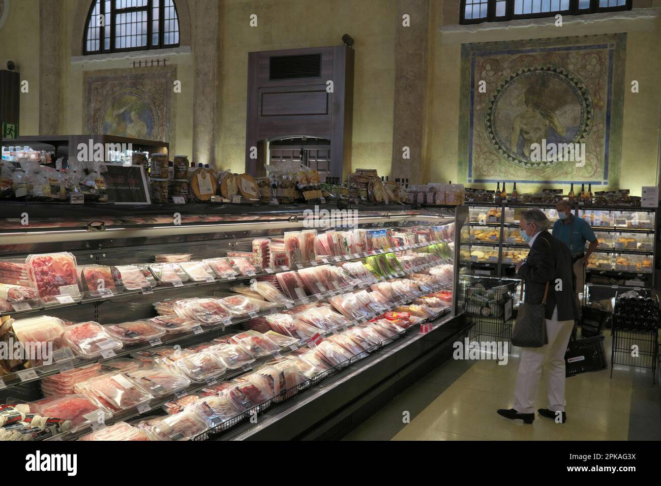 10.09.2021, Italy, Venice Sausage and food counter in a