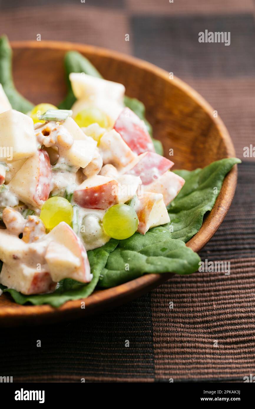 Traditional Waldorf salad with a vegan dressing on New Zealand spinach Stock Photo Alamy