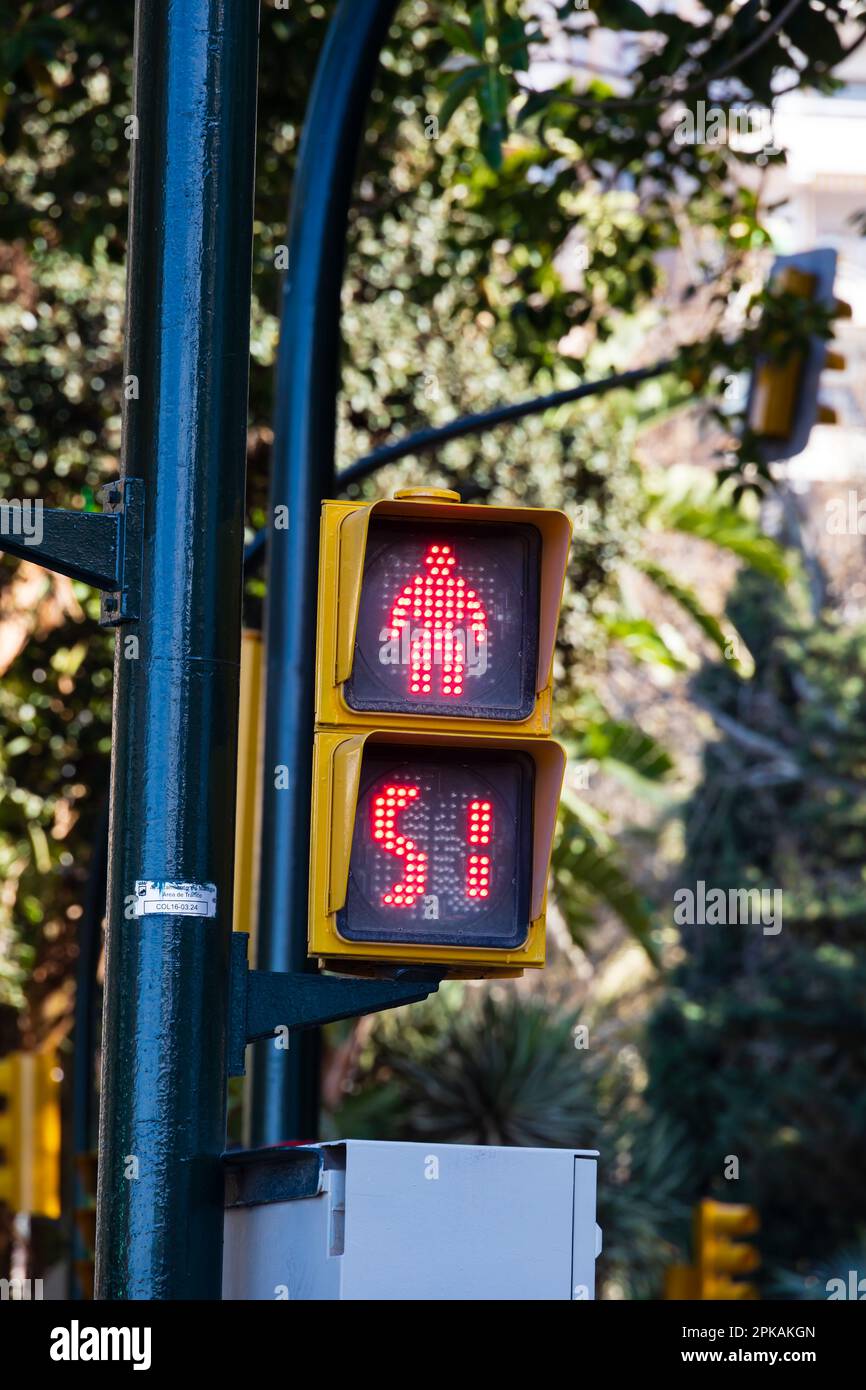 Pedestrian crossing light on red with 51 seconds until turning green. Paseo del Parque. Malaga, Andalusia, Costa del Sol. Spain. Red man, light led, r Stock Photo