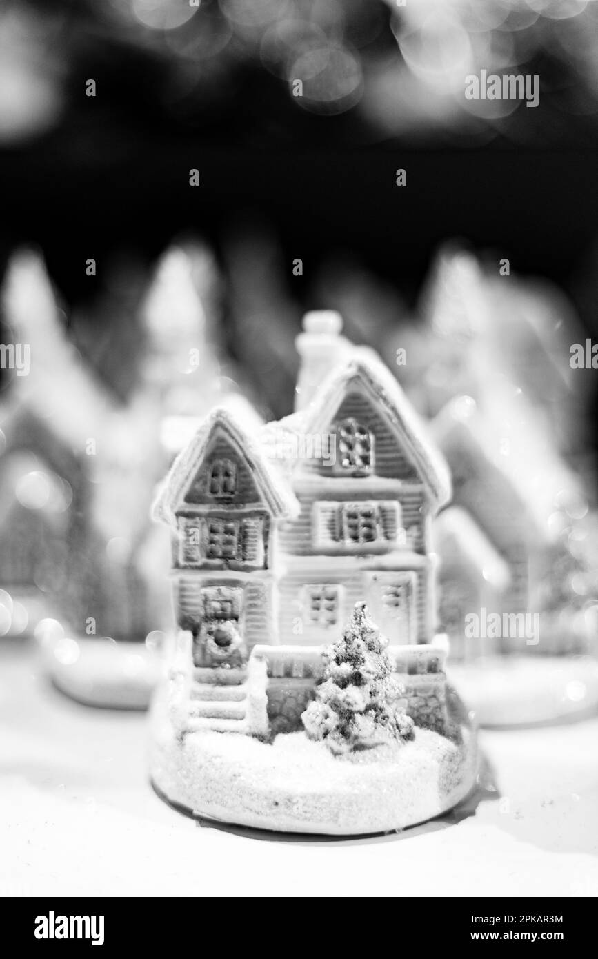 Small snowy miniature house as winter decoration Stock Photo