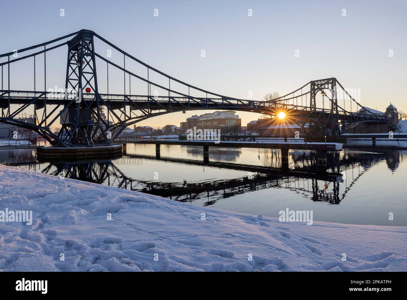 Winter atmosphere, sunrise at Kaiser-Wilhelm-Bridge, backlight shot, Wilhelmshaven, Lower Saxony, Germany Stock Photo