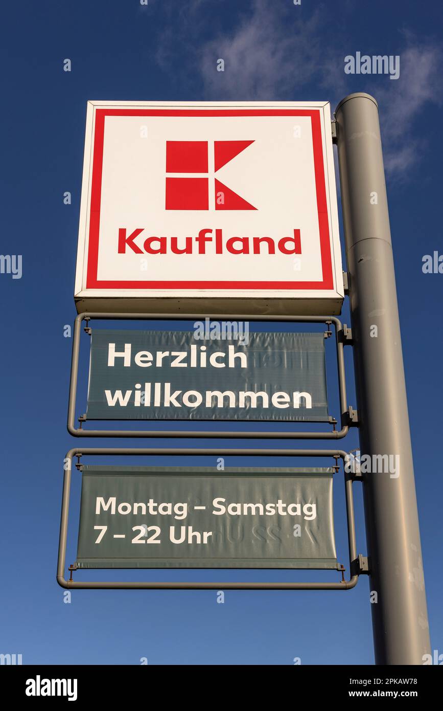 Kaufland logo with opening hours of a Kaufland store, Friedenstraße, Wilhelmshaven, Lower Saxony, Germany Stock Photo