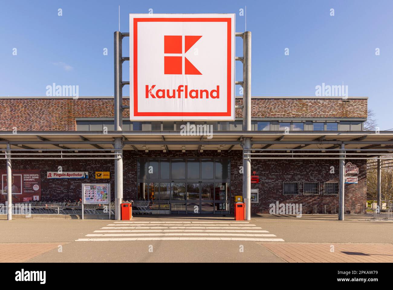 Entrance area of a kaufland store closed outside opening hours hires