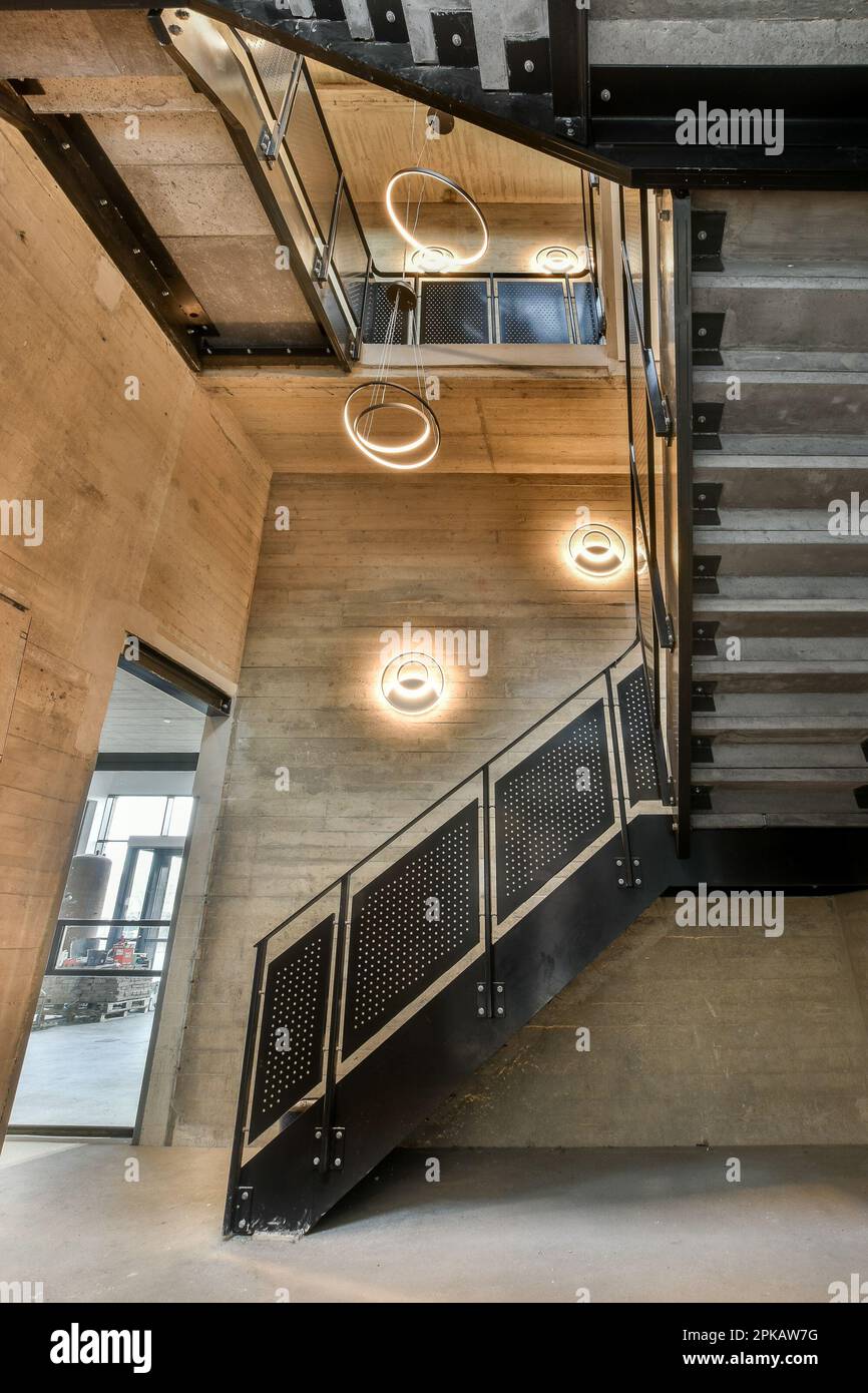 the inside of a building that looks like it's going down some stairs