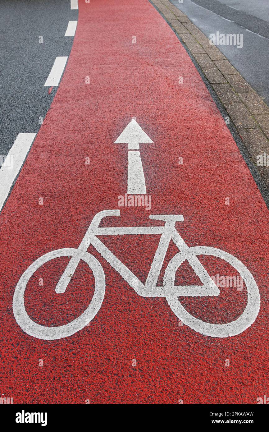 Specially marked bicycle lane with red road marking, bicycle pictogram, Wilhelmshaven, Lower Saxony, Germany Stock Photo