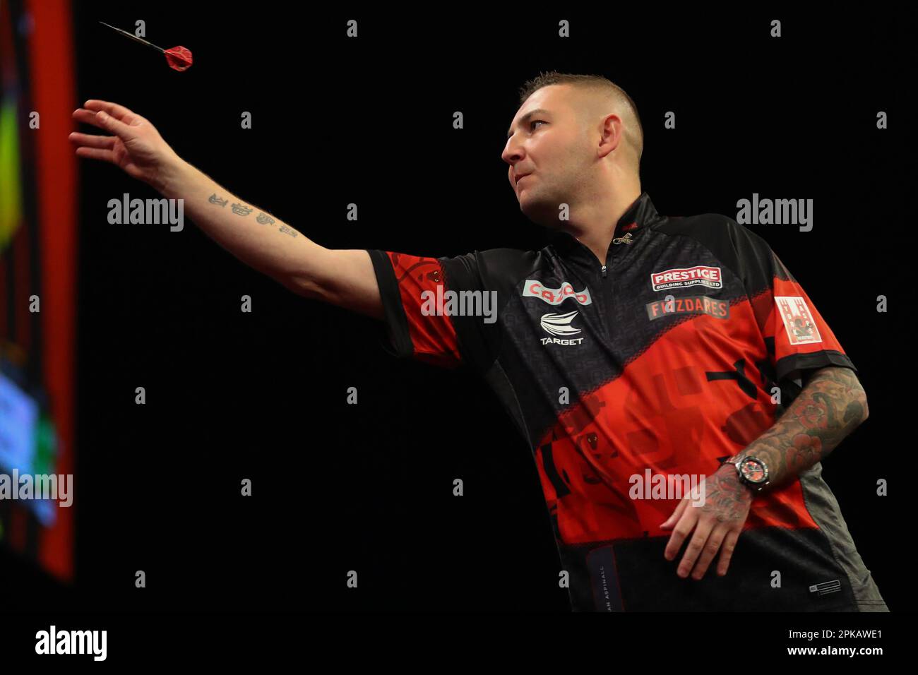 Birmingham, UK. 06th Apr, 2023. Nathan Aspinall throws a dart during
