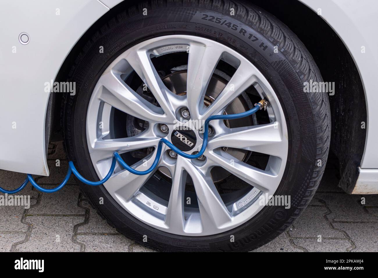 Gas station, check tire pressure, tire inflation tube with quick release, detail, icon image, check tire pressure, Stock Photo
