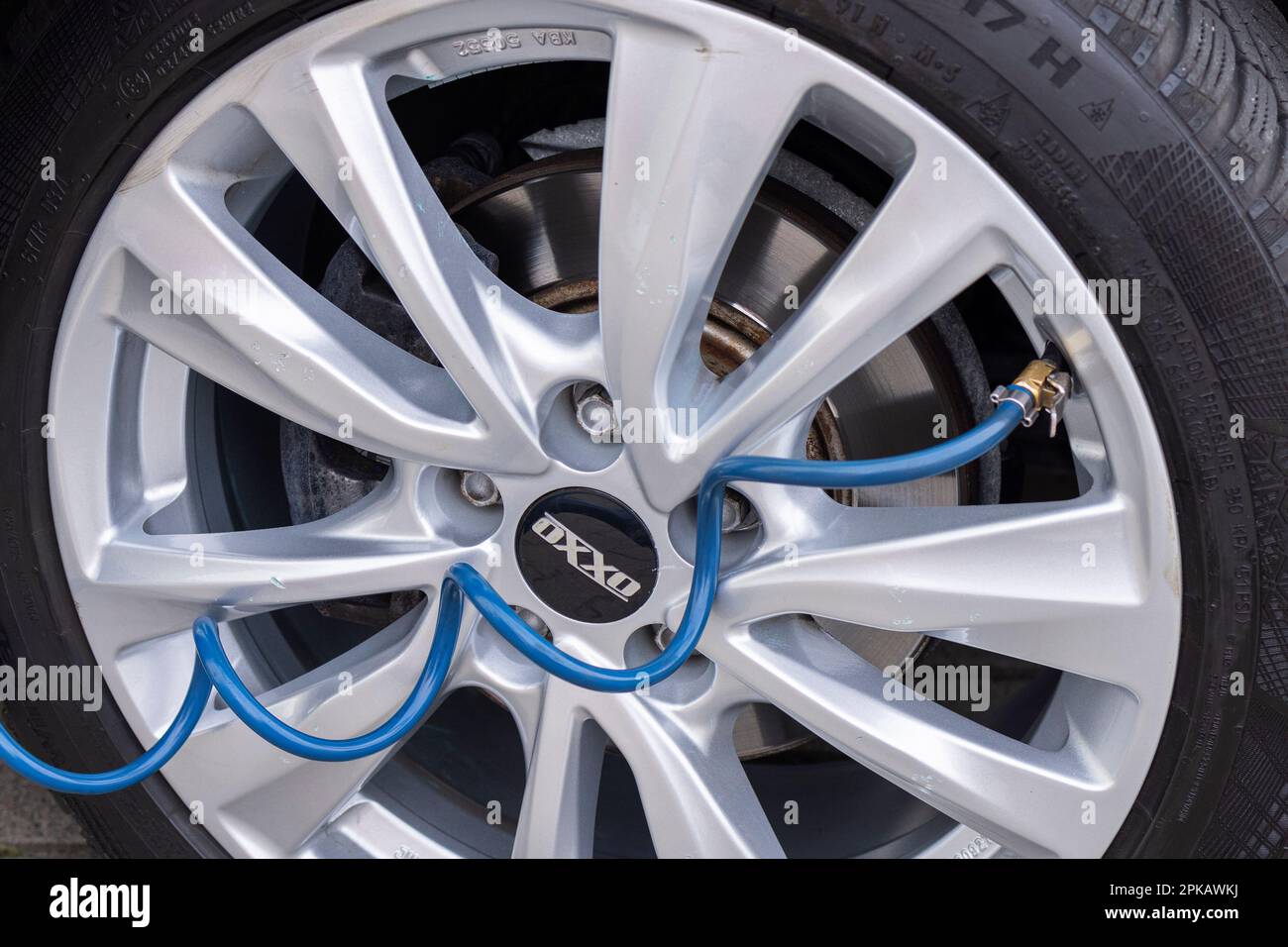 Gas station, check tire pressure, tire inflation tube with quick