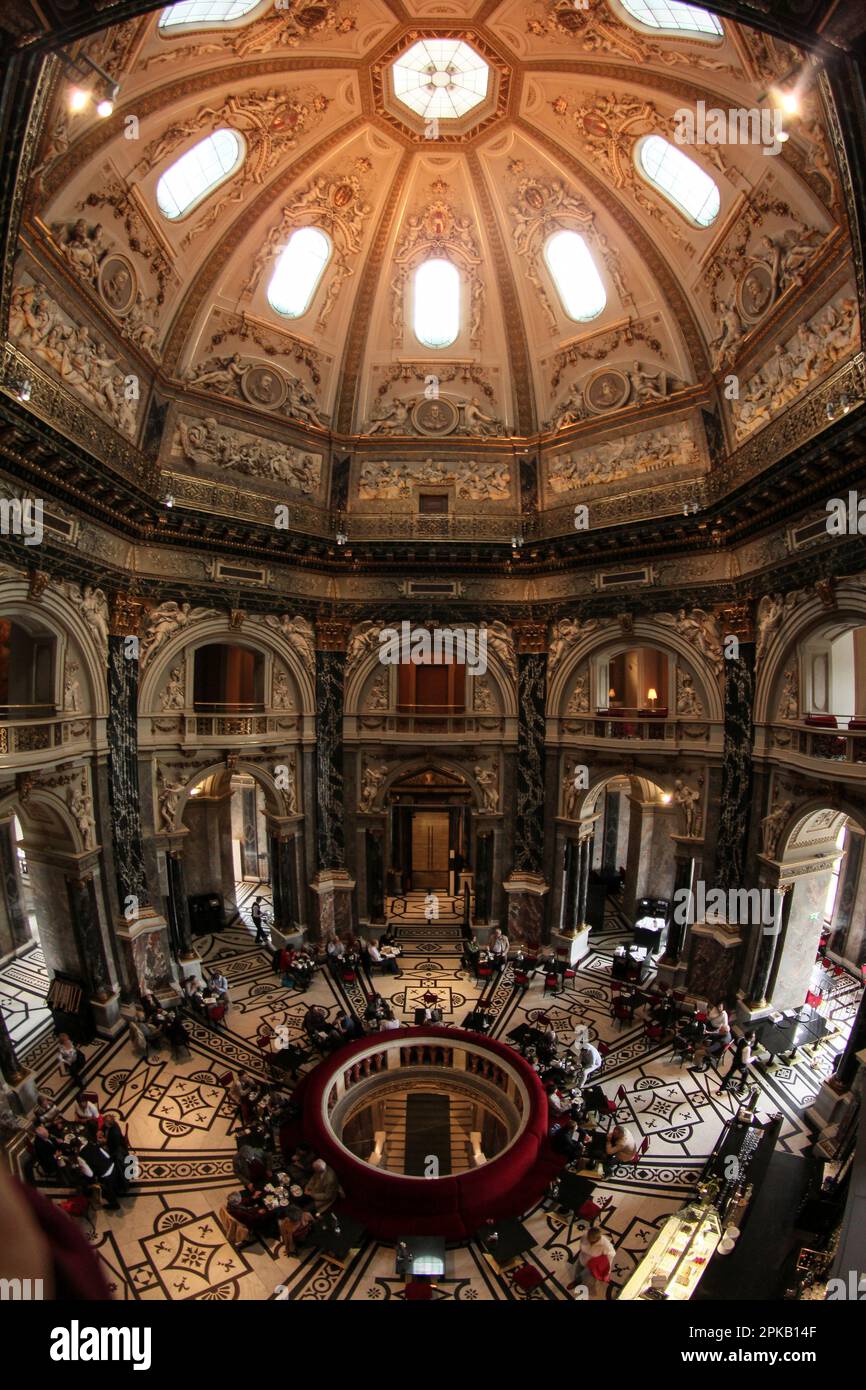 Scenic cafe beneath the cupola of the Natural history museum in Vienna