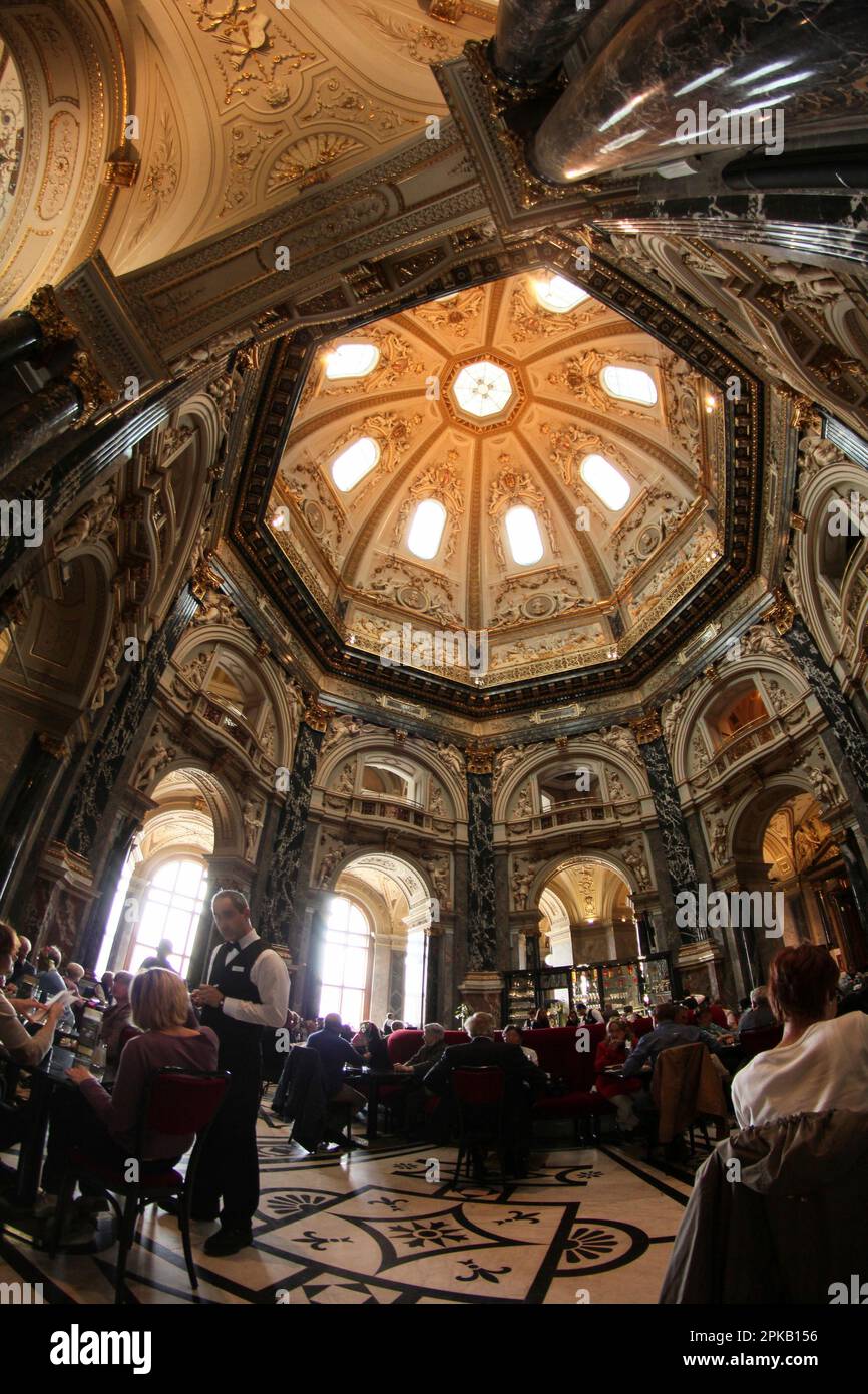 Scenic cafe beneath the cupola of the Natural history museum in Vienna