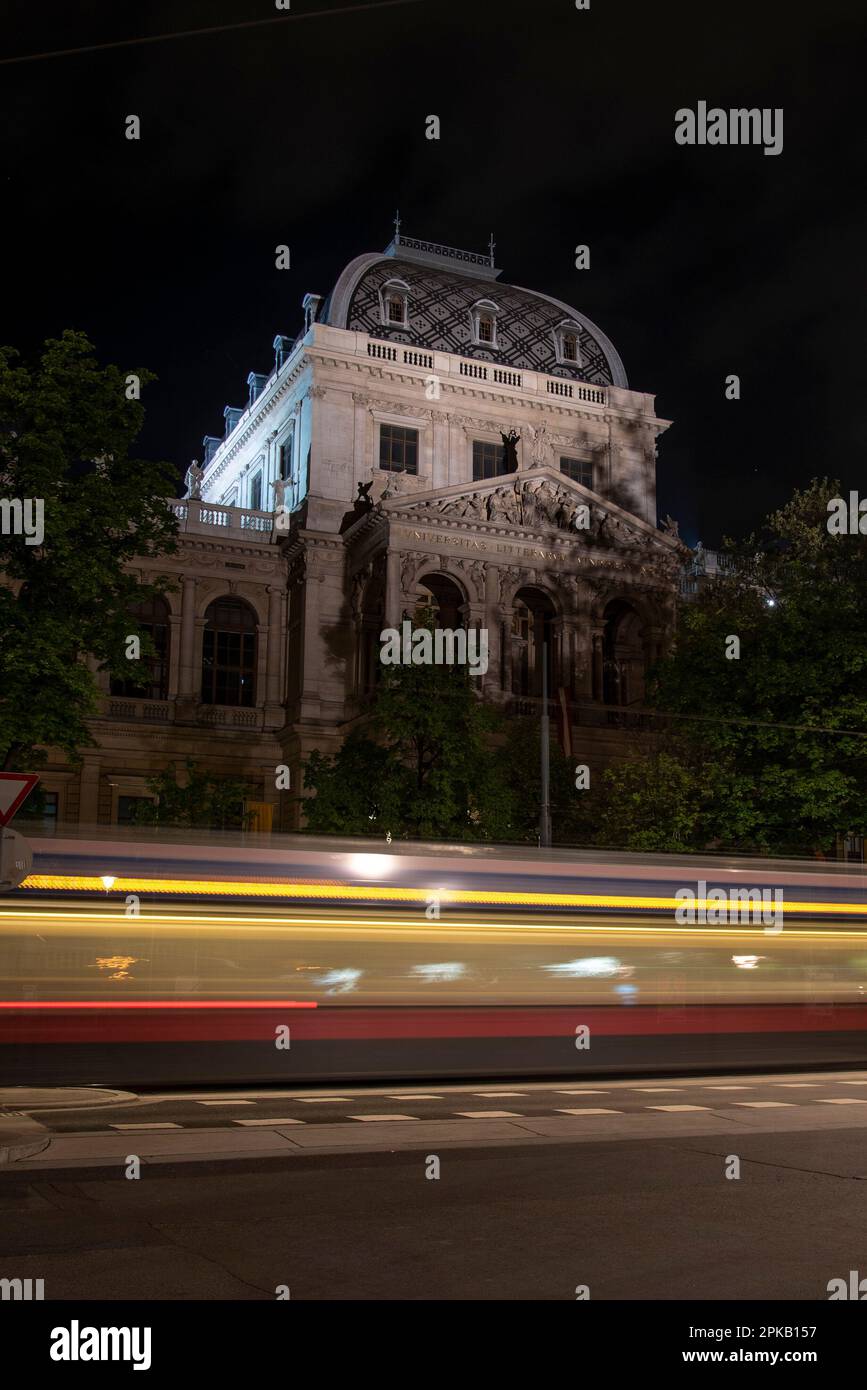Illuminated university of Vienna at night, Austria Stock Photo
