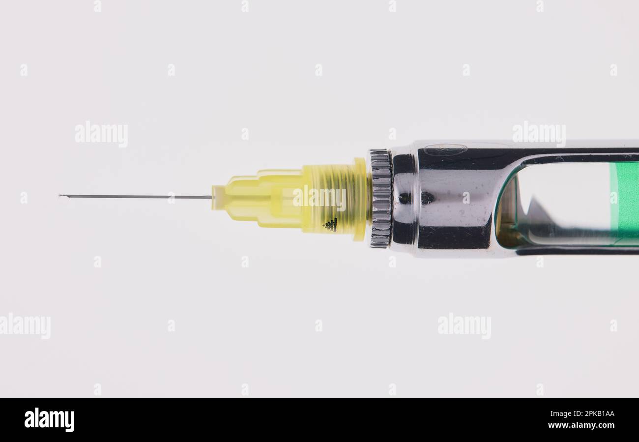 Steel dental syringe for local anesthesia, isolated on white. Carpool syringe for anesthesia in