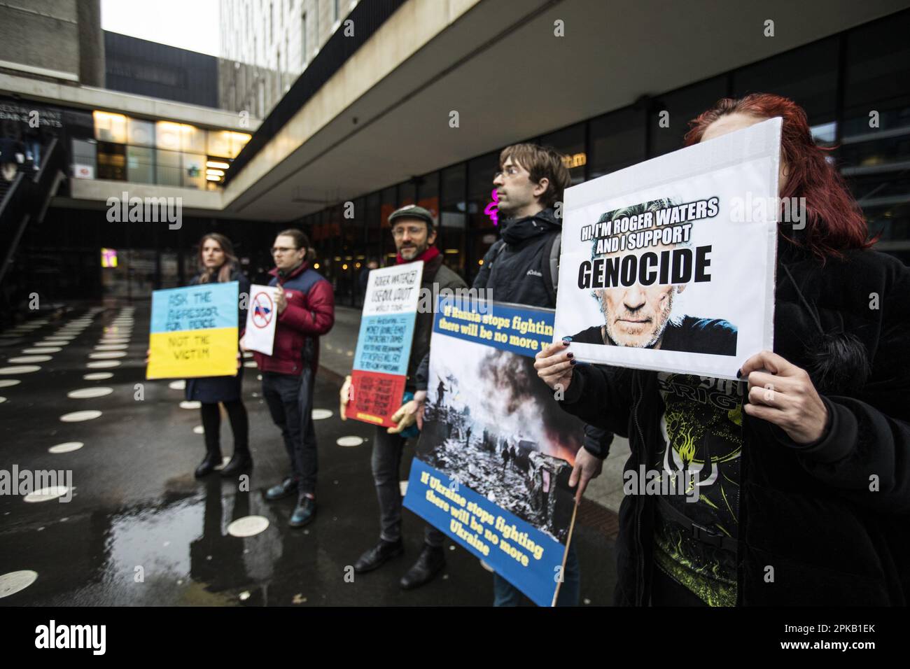 AMSTERDAM - People stand with protest signs outside the Ziggo Dome of Pink Floyd icon Roger Waters performance. ANP EVA PLEVIER netherlands out - belgium out Stock Photo