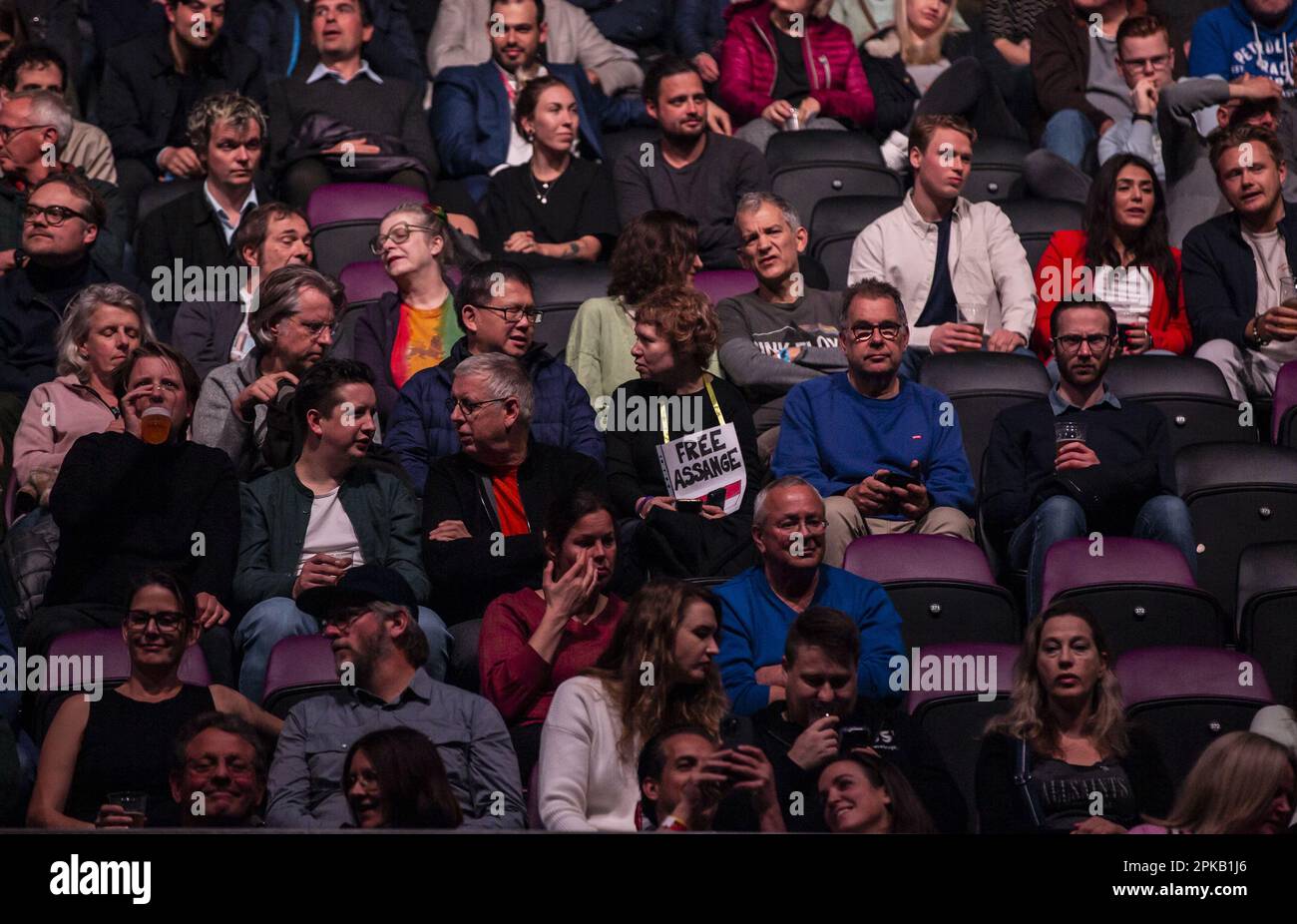 AMSTERDAM - A woman with a sign around her neck in the audience of the Ziggo Dome during Pink Floyd icon Roger Waters performance. ANP EVA PLEVIER netherlands out - belgium out Stock Photo