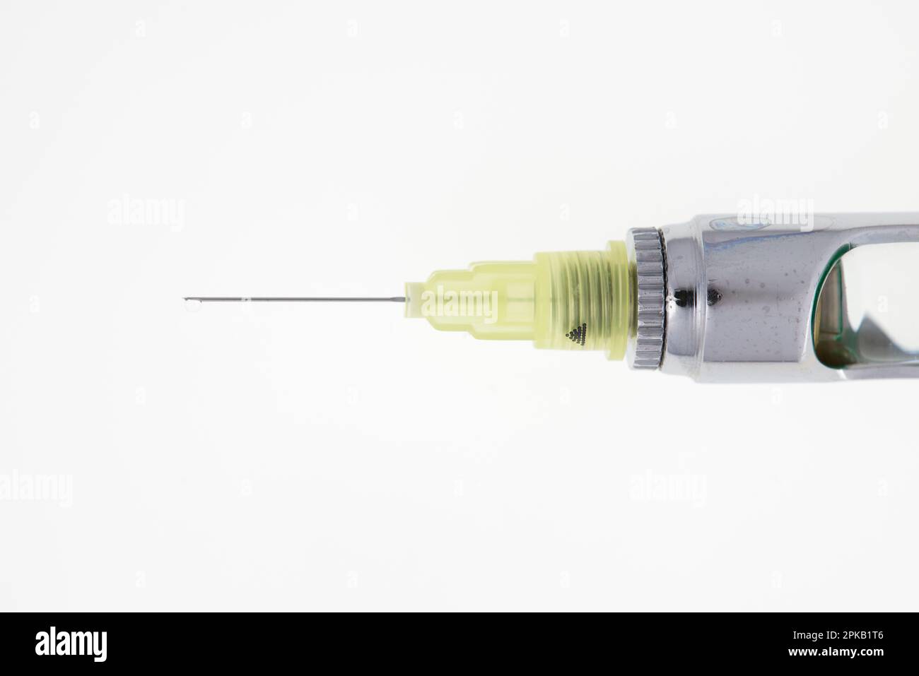 Steel dental syringe for local anesthesia, isolated on white. Carpool