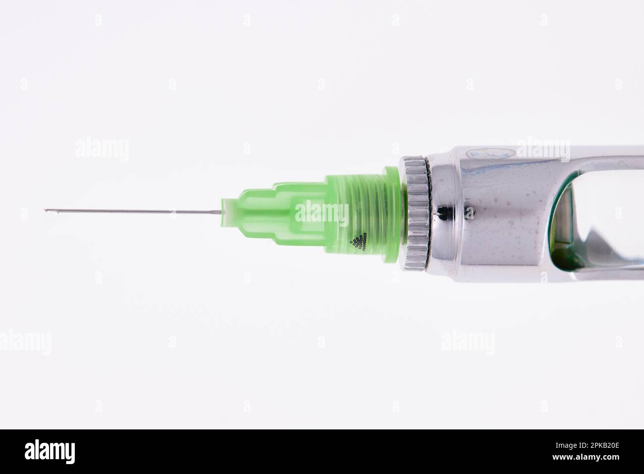 Steel dental syringe for local anesthesia, isolated on white. Carpool