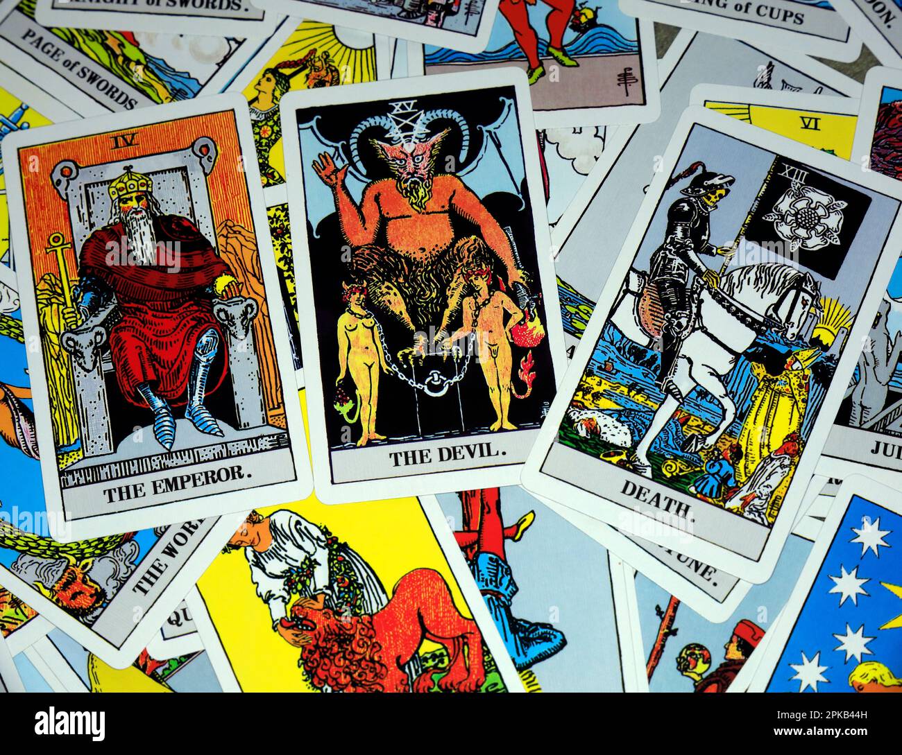 Tarot cardsscattered with Death, Th Emperor and The Devil in prominent position. Stock Photo