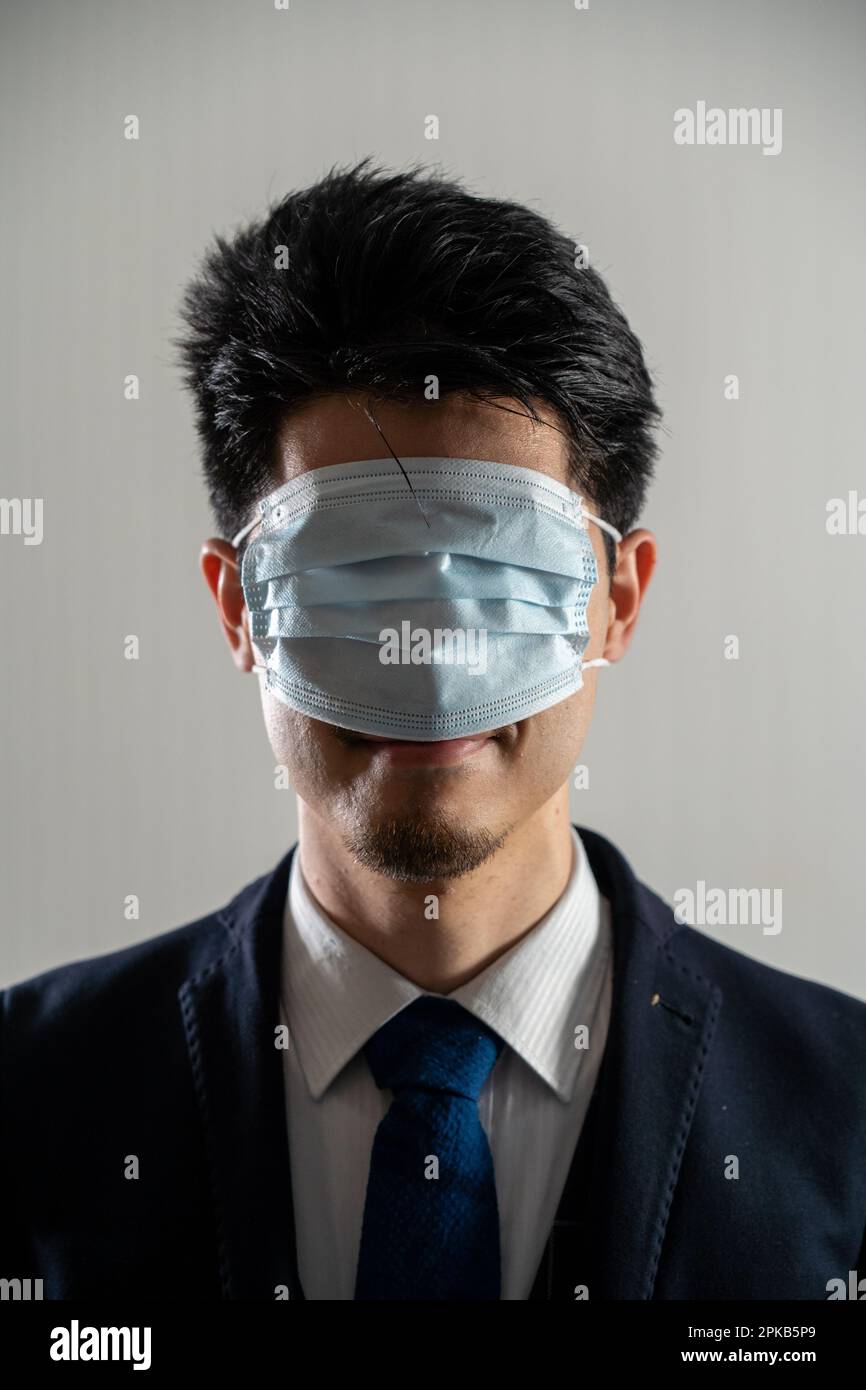 A mask over his eyes hi-res stock photography and images - Alamy