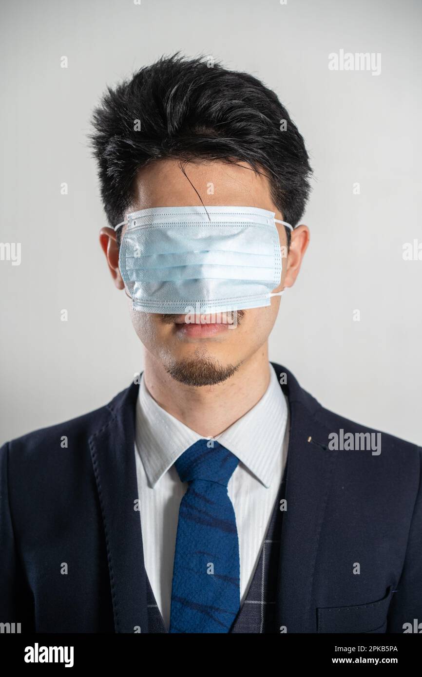 A mask over his eyes hi-res stock photography and images - Alamy