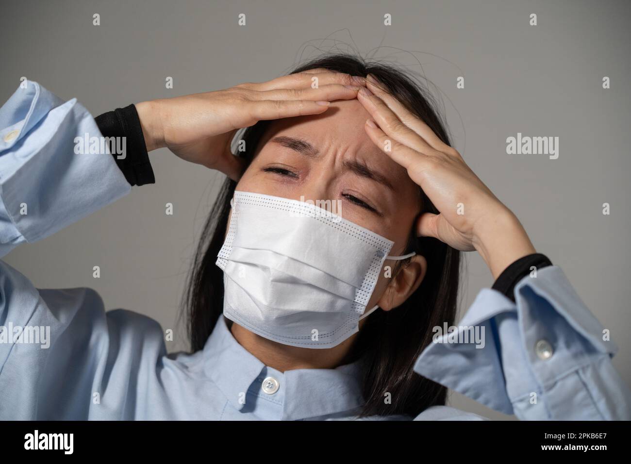 Young woman wearing protective mask. Stock Photo