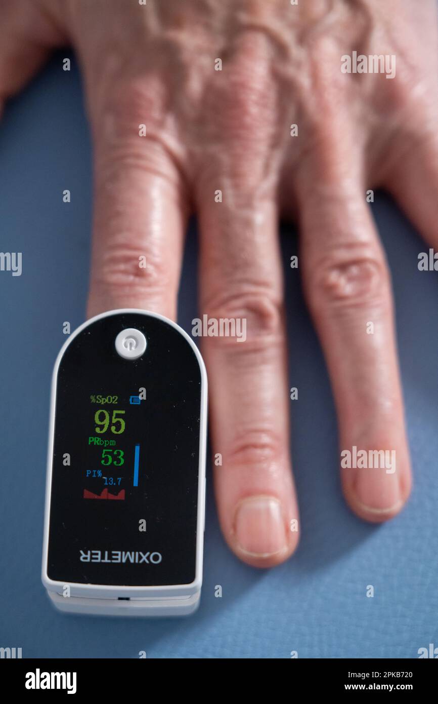 Oximeter attached to the index finger to measure the oxygen level in