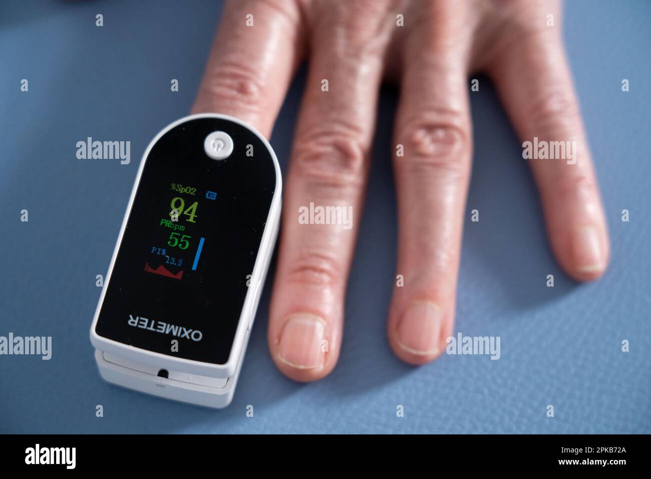 Oximeter attached to the index finger to measure the oxygen level in