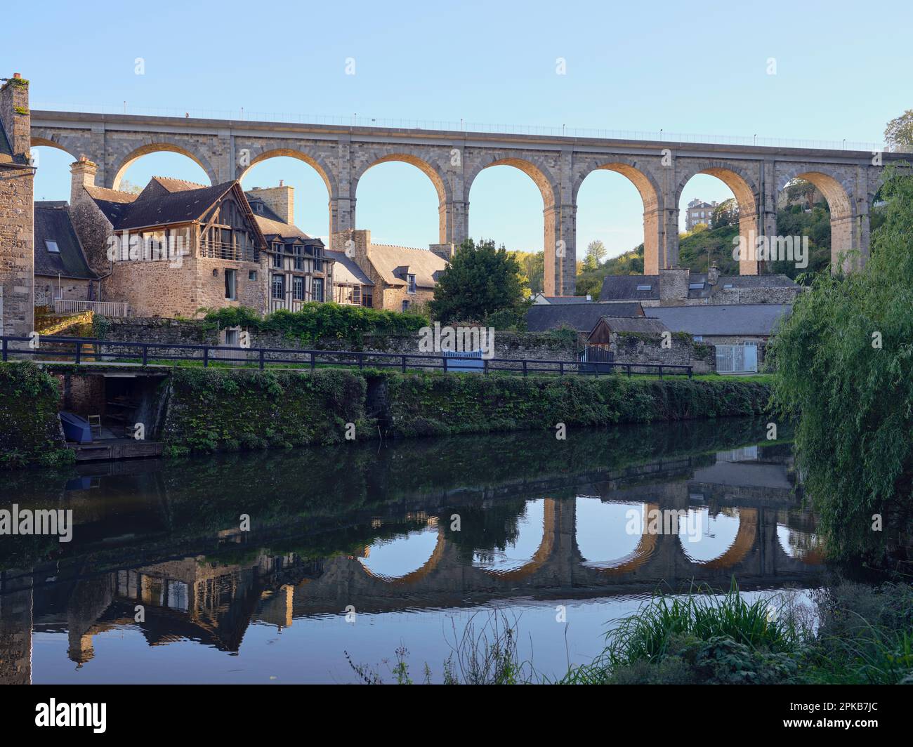 Houses on the La Rance under the viaduct of Dinan - Departement Cote-d'Armor, Bretagne, France Stock Photo