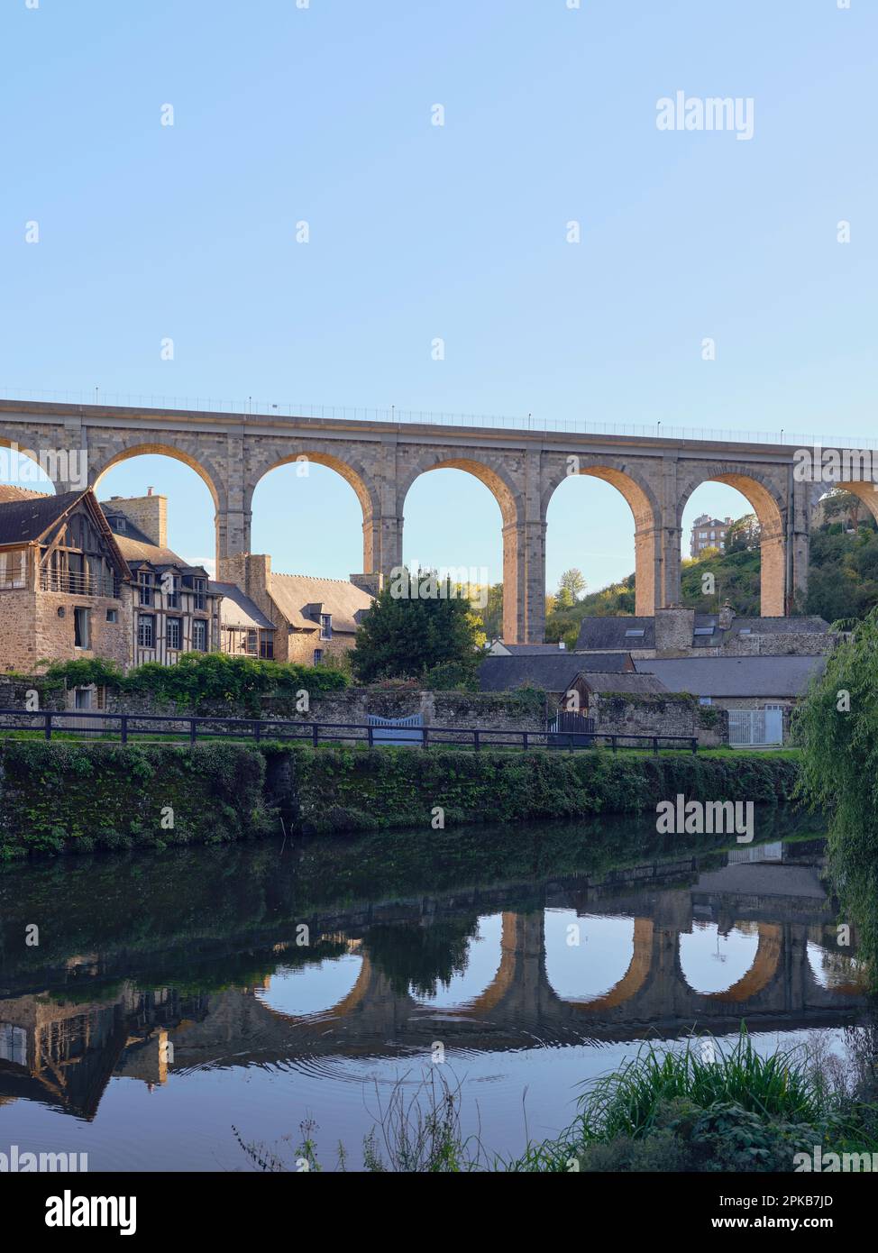 Houses on the La Rance under the viaduct of Dinan - Departement Cote-d'Armor, Bretagne, France Stock Photo