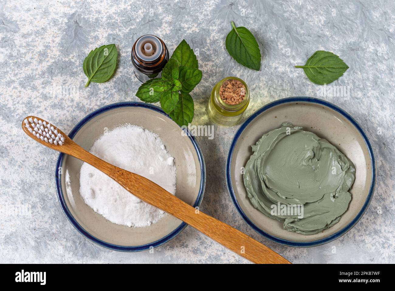Homemade toothpaste made from baking soda, green clay and mint