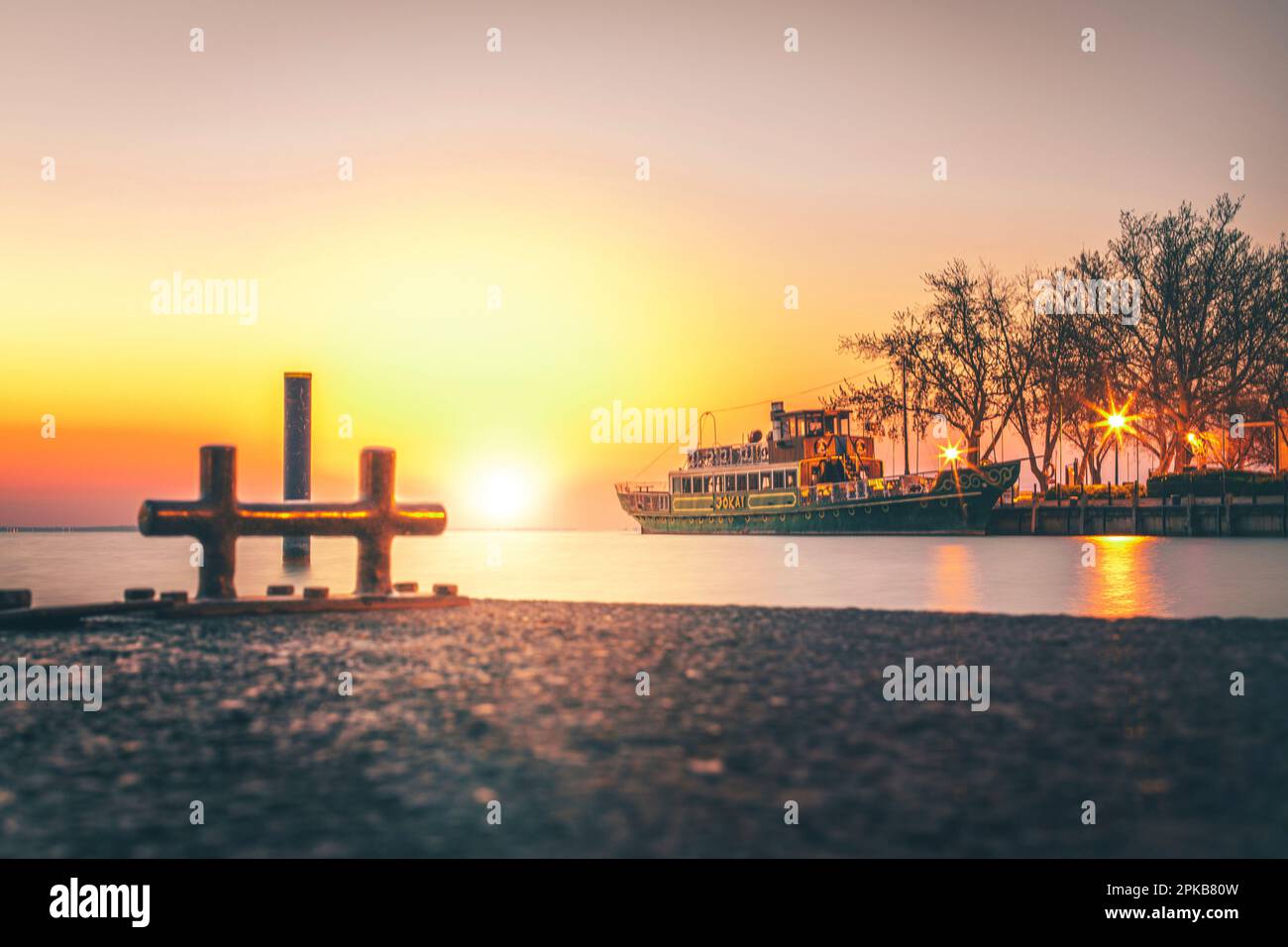 Beautiful morning sunrise at the harbor of Balatonfüred at Lake Balaton / Plattensee in Hungary Stock Photo