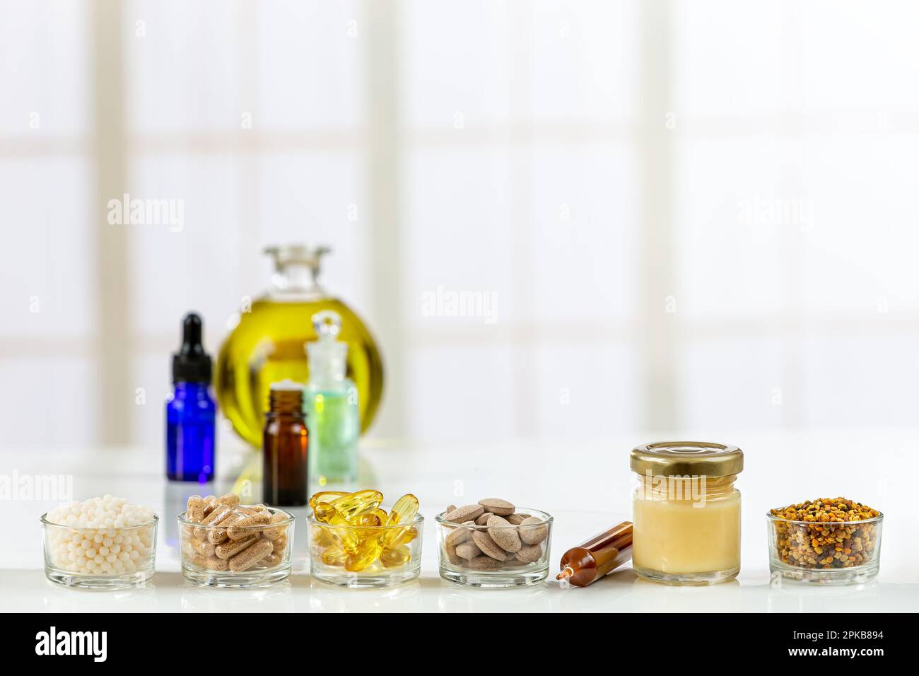 Food supplements, homeopathy, essential oils and bee products. Stock Photo