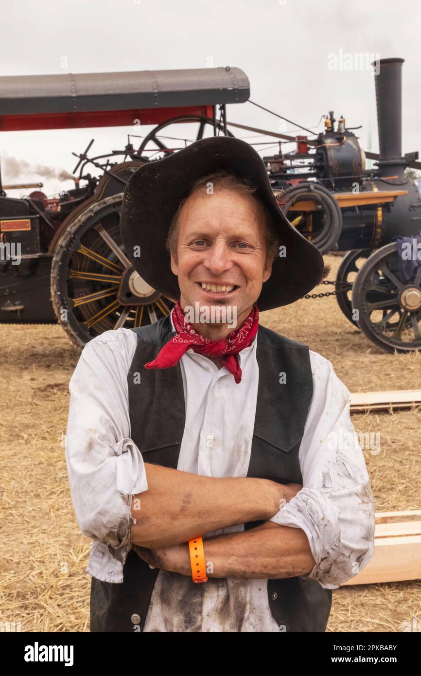 Portrait of steam engine driver dressed in traditional farming costume hires stock photography