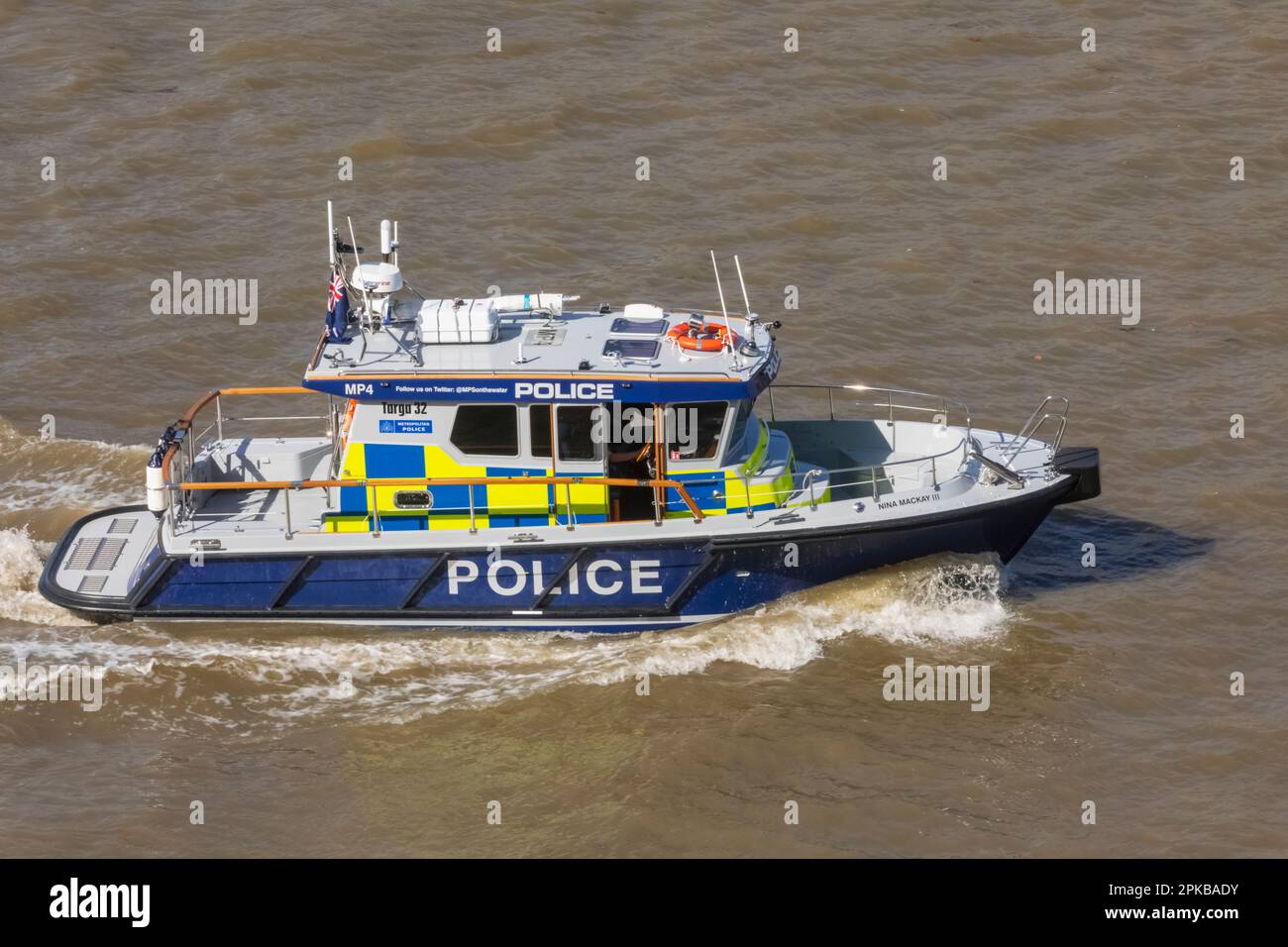 England, London, Metropolitan Police Boat on River Thames Stock Photo