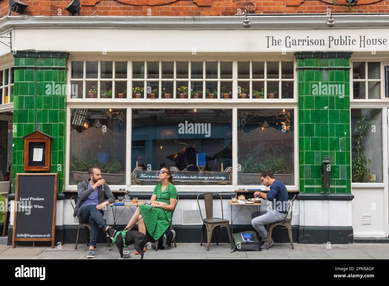 England, London, Southwark, Bermondsey Street, People Dining Alfresco Stock Photo