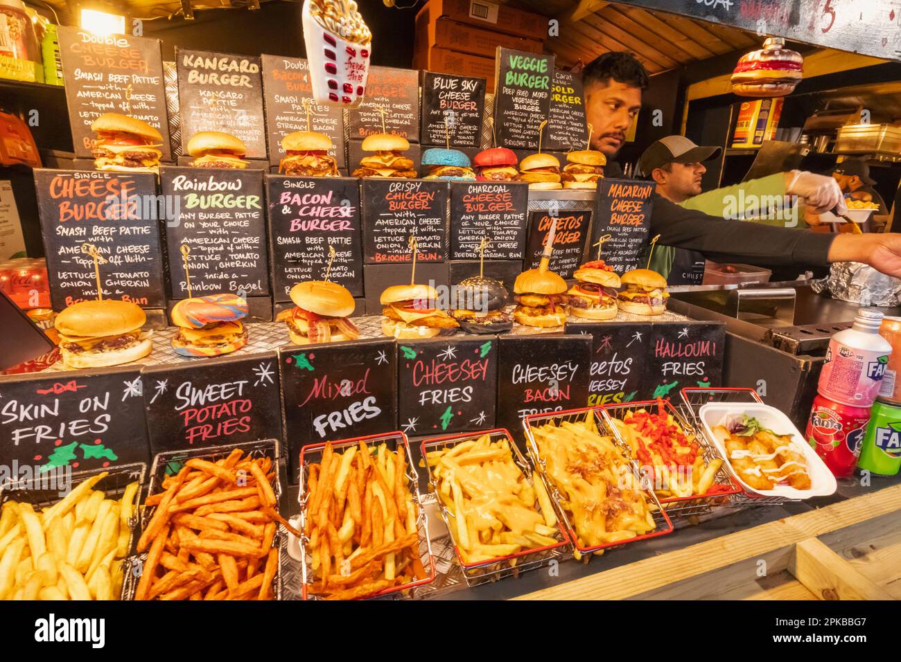 England, London, Southwark, Riverside Christmas Market, Food Stall Display of Burgers and Fries Stock Photo