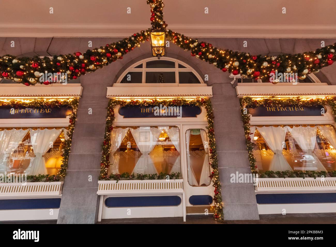 England, London, Piccadilly, Ritz Hotel, Exterior View of The Rivoli Bar and Christmas Decoration Stock Photo