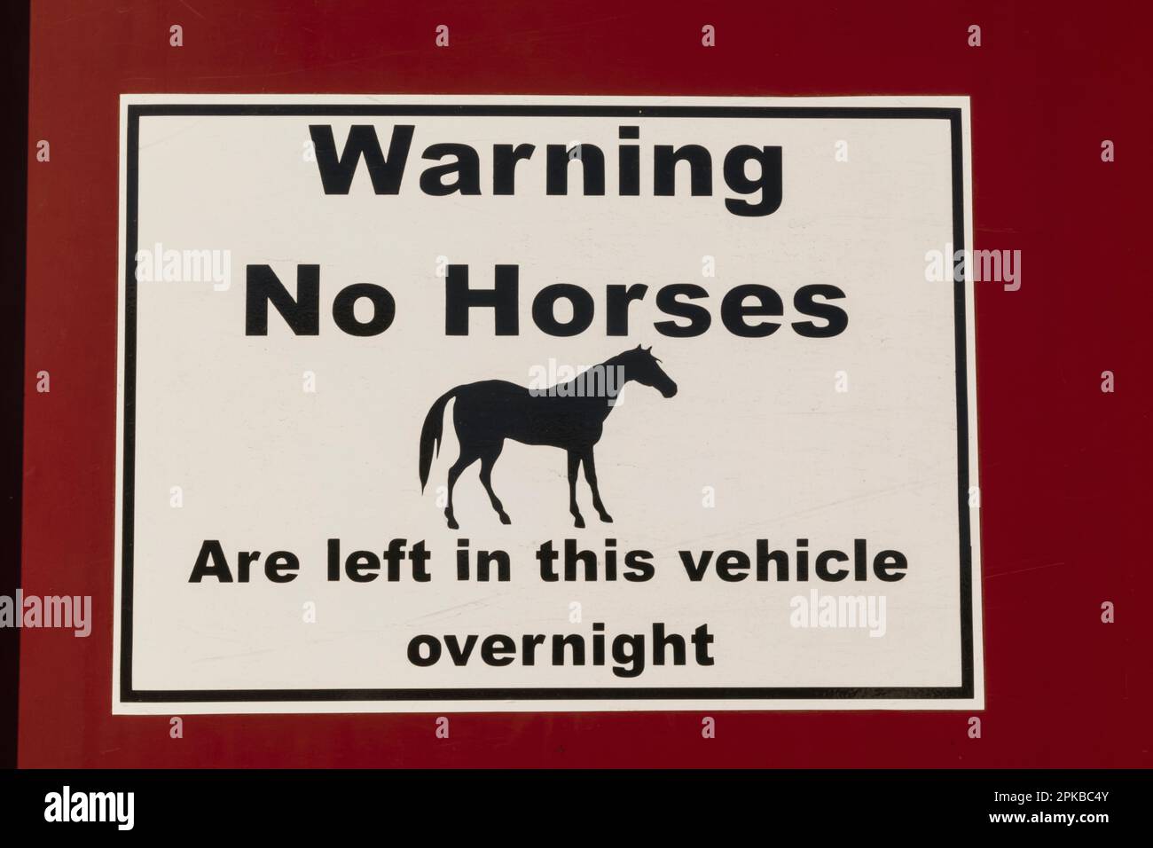 England, Dorset, Shaftesbury, The Annual Wessex Heavy Horse Show and Country Fair, Warning Sign on Horse Trailor Stock Photo
