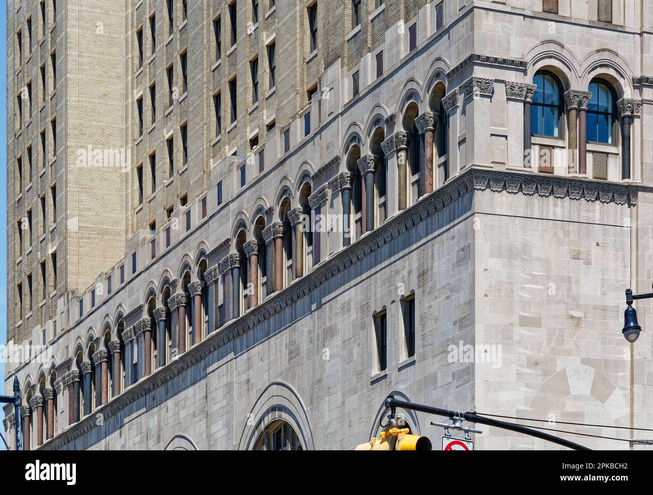 Williamsburgh Savings Bank’s limestone base is richly carved with savings and banking symbols