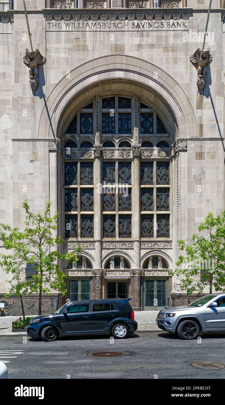 Williamsburgh Savings Bank’s limestone base is richly carved with