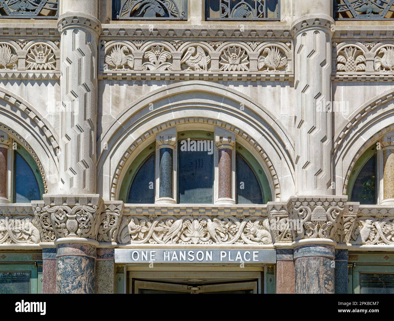 Williamsburgh Savings Bank’s limestone base is richly carved with