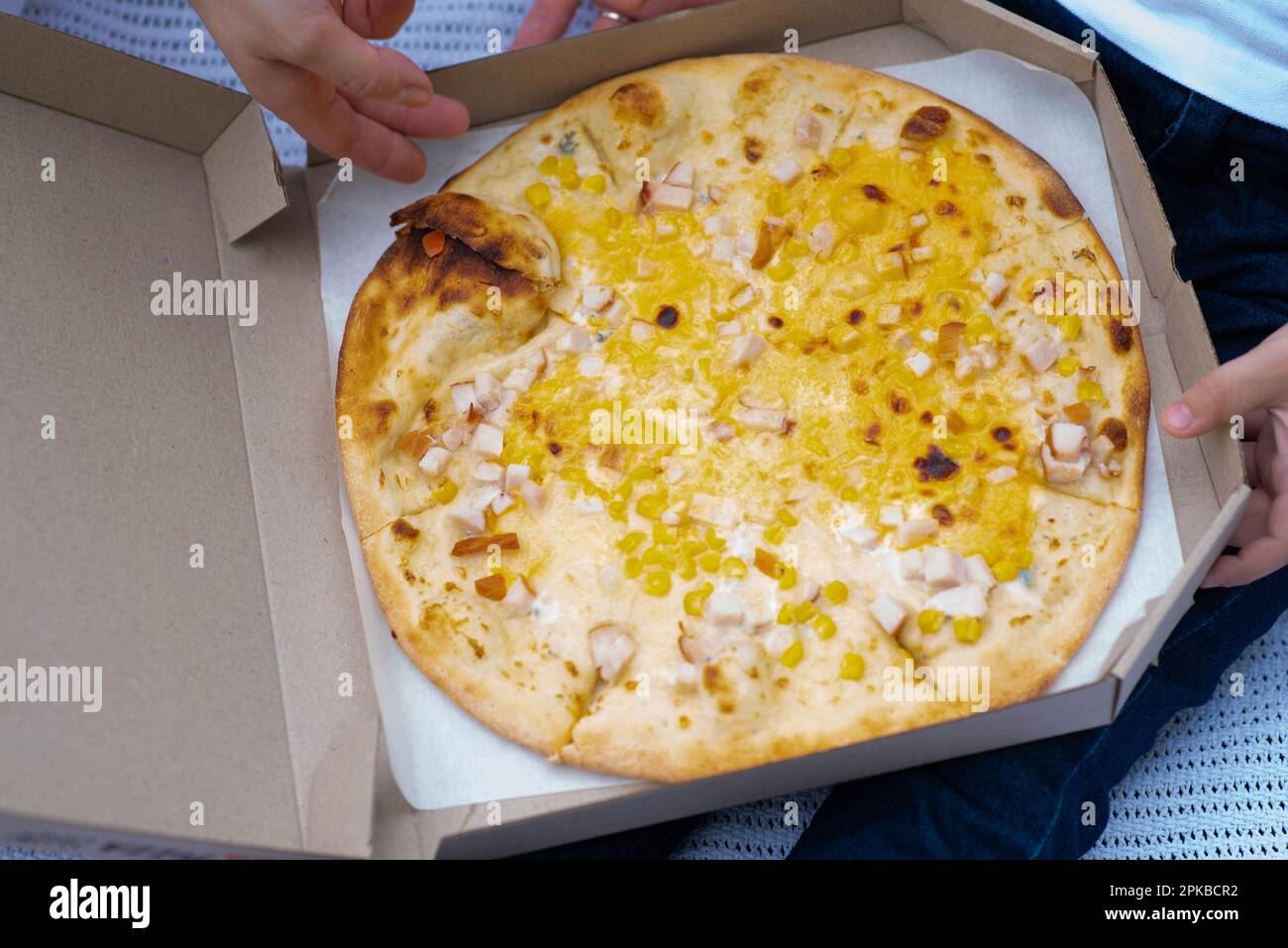 Delicious pizza Four Cheeses with cheddar, Parmesan, mozzarella and