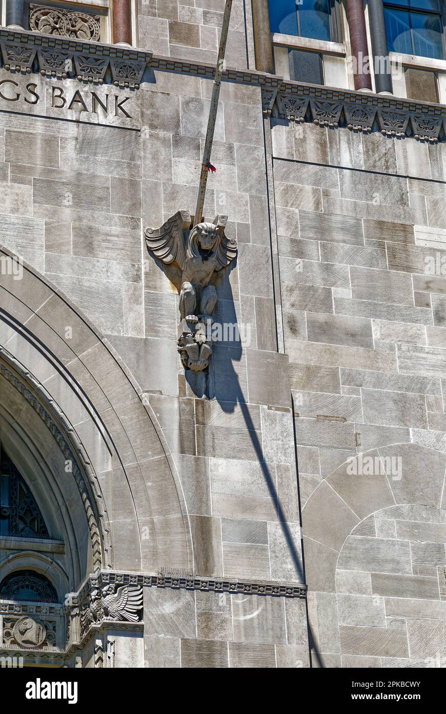 Williamsburgh Savings Bank’s limestone base is richly carved with savings and banking symbols