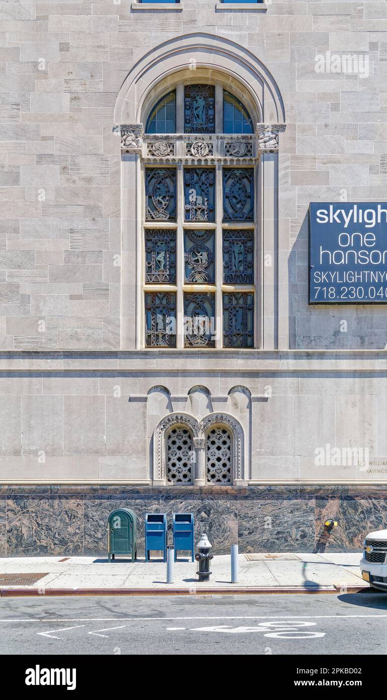 Williamsburgh Savings Bank’s limestone base is richly carved with