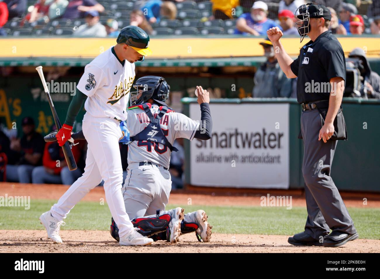 Oakland Athletics shortstop Aledmys Diaz (12) strikes out in the 10th  inning against the Cleveland Guardians at RingCentral Coliseum in Oakland,  Calif., Wednesday, April 5, 2023. (Santiago Mejia/San Francisco Chronicle  via AP