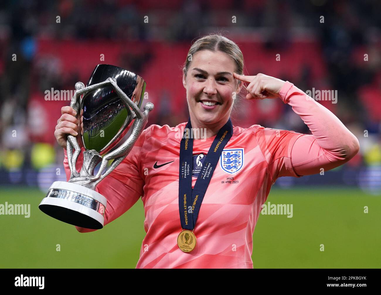 England goalkeeper Mary Earps celebrates with the trophy following the