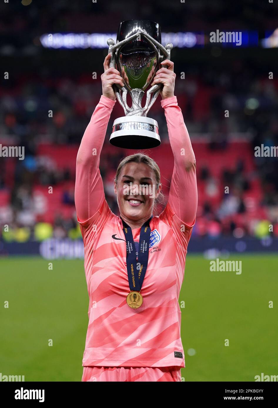England goalkeeper Mary Earps celebrates with the trophy following the