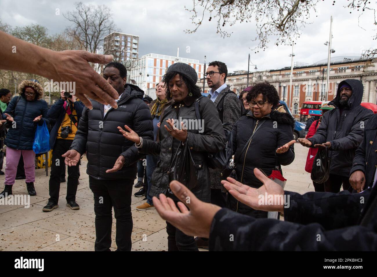 Windrush, UK. 06th Apr, 2023. People seen praying in Windrush square during the commemoration. Fifth anniversary of remembering those who have been impacted and exposing the Windrush scandal which saw people from the Caribbean treated like ‘illegal immigrants' by the Home Office despite arriving in Britain legally. Credit: SOPA Images Limited/Alamy Live News Stock Photo