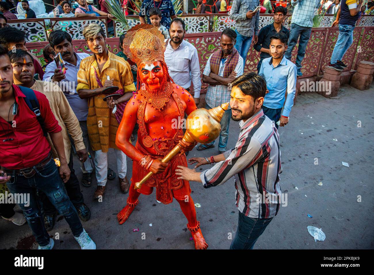 An Indian Hindu devotee dressed as the Monkey God, Hanuman during a procession for the Hindu festival Hanuman Jayanti. The festival commemorates the birth of the Hindu deity Hanuman. Stock Photo