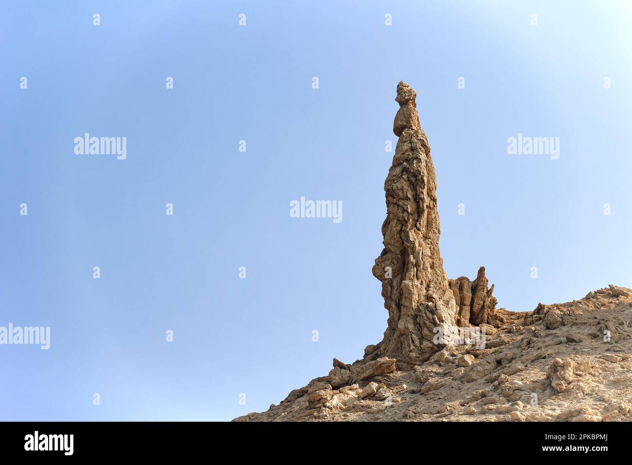 Stone statue of the wife of Prophet Lot on the bank of the Dead Sea